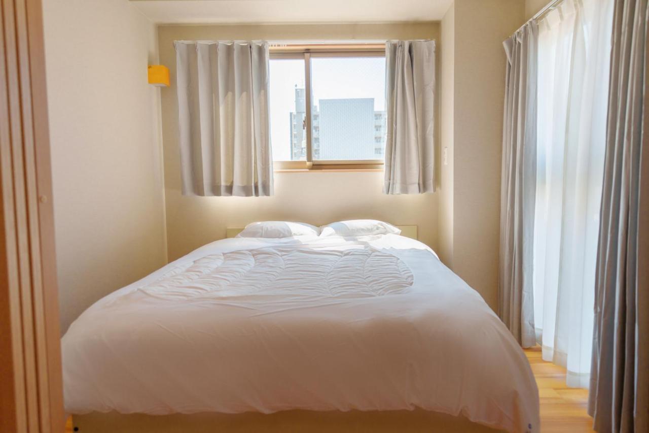 Dc桜の苑601洋室双人床 Hotel Osaka Buitenkant foto